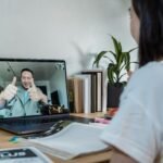 A student engaged in an interactive online class via video conference.